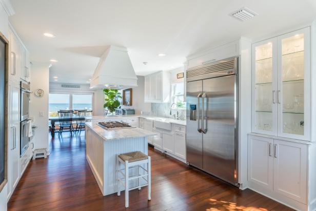 White Open Plan Kitchen With Water View | HGTV