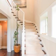 Bright White Staircase Features Cream-Colored Runner, Coastal Art