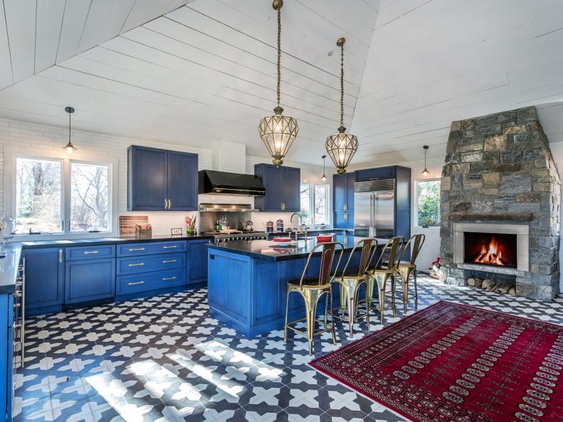 Kitchen with Blue Cabinets and Moroccan Tiles