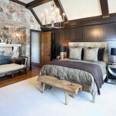 Rustic Bedroom with Stone Fireplace, Paneled Accent Wall