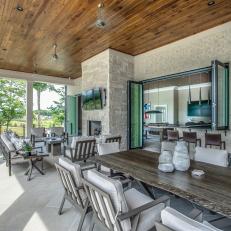 Transitional Covered Patio with Lounging, Dining Zones