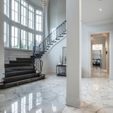 Elegant Foyer with Curved Staircase, Modern Crystal Chandelier