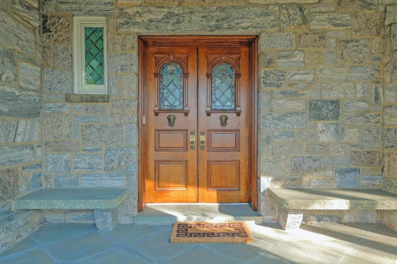 Stone Entryway To The Front Door With Small Window