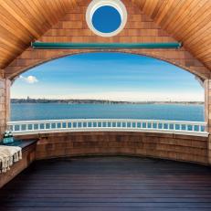 Craftsman Style Veranda With Waterfront Views