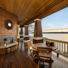 Expansive Craftsman Style Porch With Fireplace