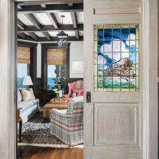 Sliding Door Adorned With Stained Glass Depiction of Home