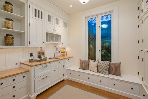 Transitional Butler S Pantry Boasts Floor To Ceiling Cabinets For