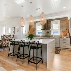Neutral Open Plan Kitchen With Black Stools