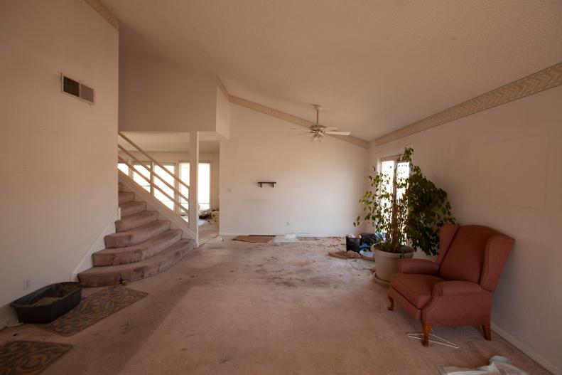The original dirty living room in the home that Bristol and Aubrey are renovating together as seen on Flip or Flop Vegas