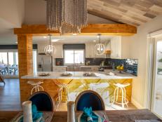 The new open kitchen in the costal beach house that Aubrey and Bristol renovated together, Aubrey brought in  wood accents on the kitchen peninsula to go with the beachy theme as seen on Flip or Flop Vegas