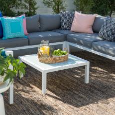 Contemporary Gray Outdoor Seating Area with White Coffee Table 