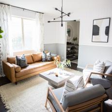 Gray Scandinavian Living Room With Brown Sofa
