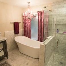 Modern White Master Bathroom with Pink Chandelier and Glass Shower 
