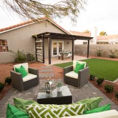 Contemprary Gray Backyard with Gray Wicker Furniture and Green Pillows