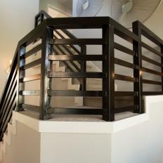 Contemporary Gray Stairs with Custom Black Railing 