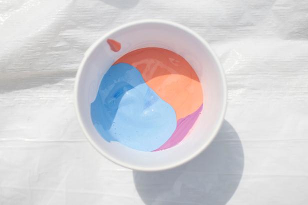 How to make pour art painting kid-friendly with washable paints.