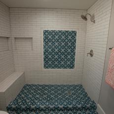 White Coastal Bathroom with Blue and White Tile Floor and Backsplash 