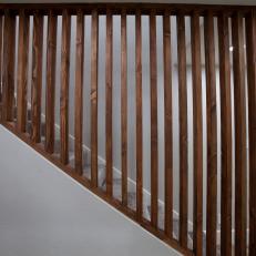Neutral Midcentury Modern Staircase with Brown Railings