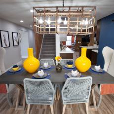 Multicolor Midcentury Modern Dining Room with Orange Chairs 