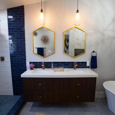 Blue and White Midcentury Modern Master Bathroom with Brown Vanity