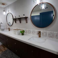 Black and White Midcentury Modern Master Bathroom with Black Vanity 