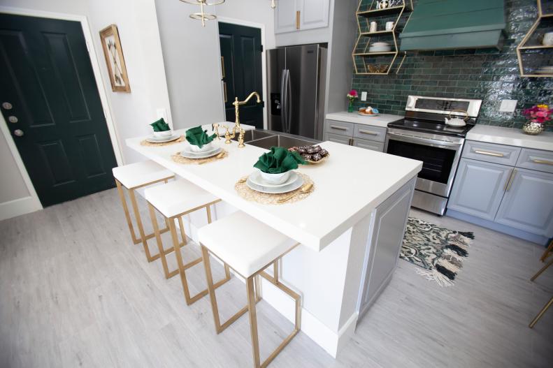  White Kitchen with White Island and Stools 