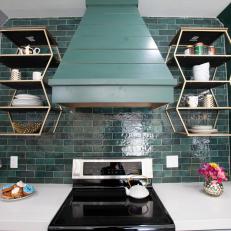 Contemporary Gray Kitchen with Green Backsplash and Gold Shelves 