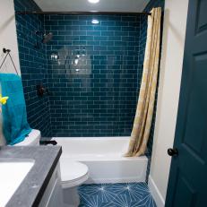 Contemporary White Bathroom with Blue Tile Shower and Yellow Shower Curtains 