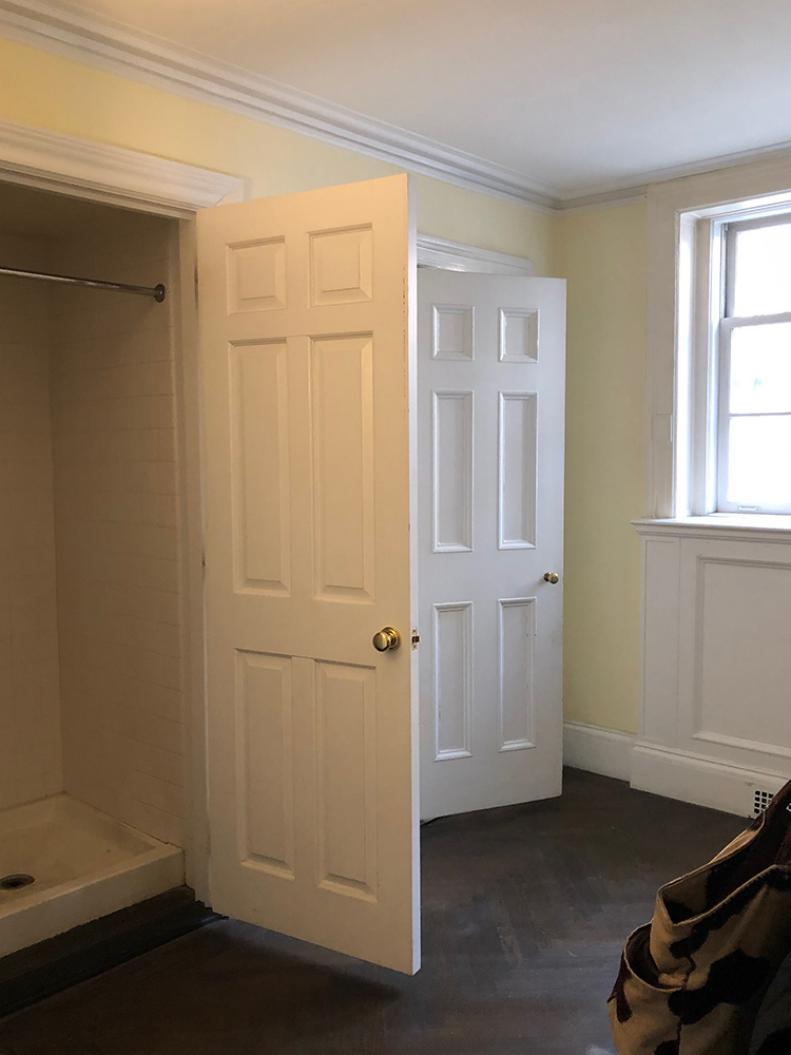 Before this space became a mudroom, it was a bland reception room—located right next to the front door.