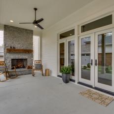 Covered Concrete Patio With Stone Outdoor Fireplace