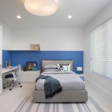 Boy's Bedroom With Blue Accent Wall
