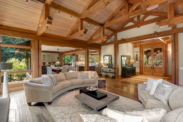 Sitting Area With Curved Gray Sofas Under Vaulted Wood Ceiling Hgtv