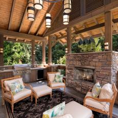 Covered Patio With Fireplace and Outdoor Kitchen