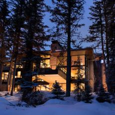 Snow-Covered Grounds Surround Contemporary Home