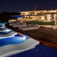 In-Water Loungers in Swimming Pool at Nighttime