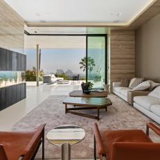 Neutral Contemporary Living Room Opens to Views of LA Skyline