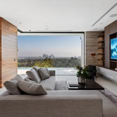 Neutral Contemporary Living Room With Open Retractable Doors