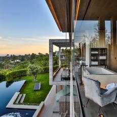 Bird's-Eye View of Side of Contemporary House With Infinity Swimming Pool
