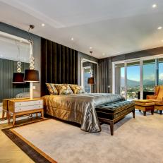Grand Master Bedroom With Rich, Metallic Designs