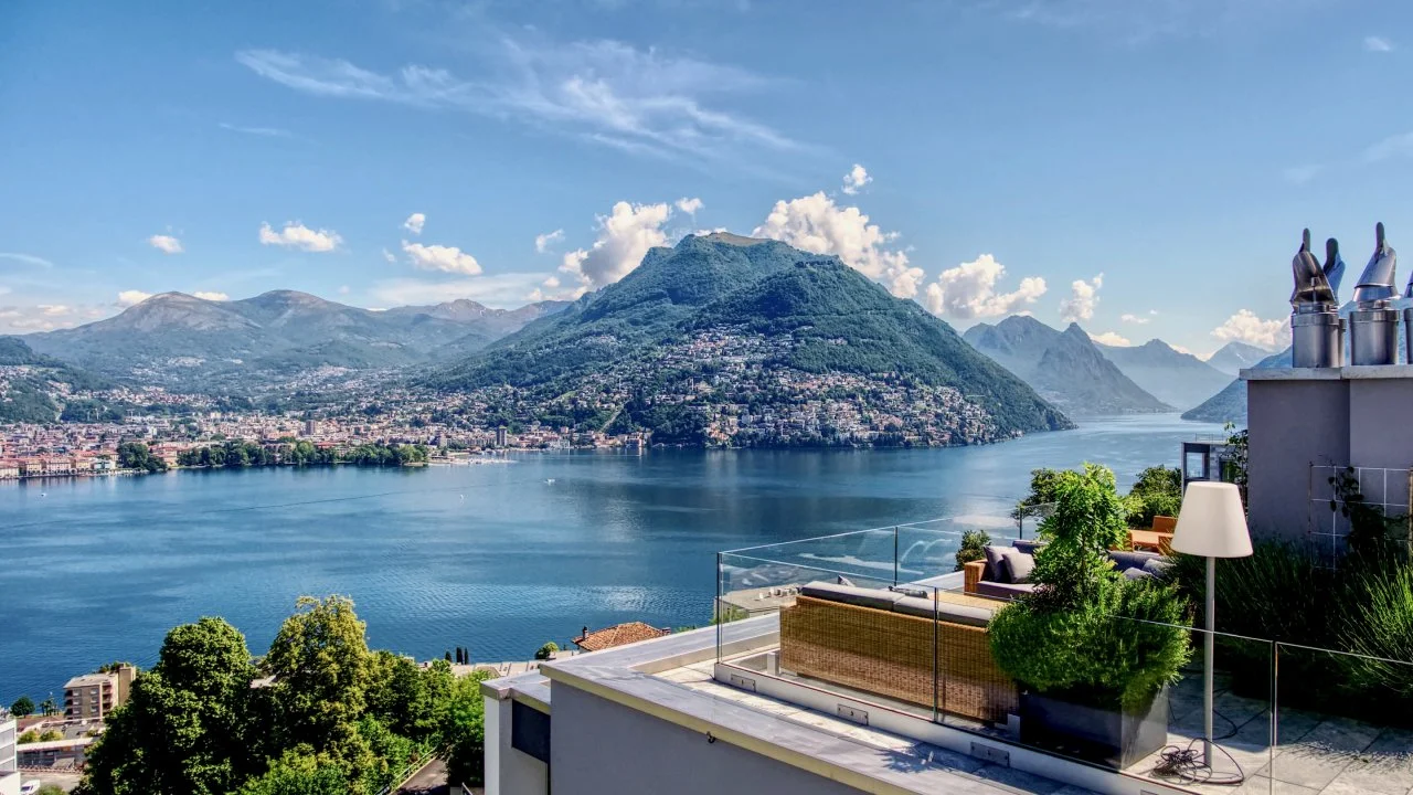 Luxury Swiss Penthouse With Views of Lake Lugano and Mountains | HGTV
