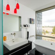 Modern Black-and-White Bathroom With Inviting Soaking Tub