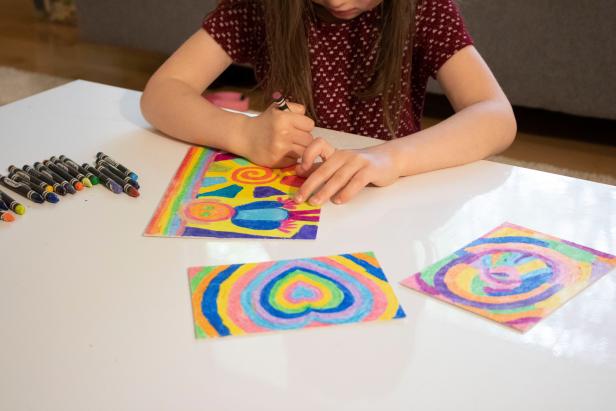 Learn how to make your own rainbow-revealing scratch art.