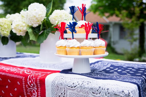 A Patriotic Bandana Tablecloth WIth a Tower of Cupcakes