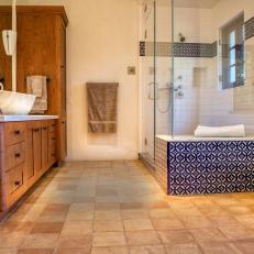 Mediterranean Style Master Bath Trimmed With Spanish Tile, Marble Detail