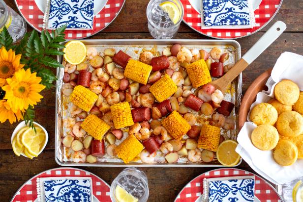 Inspired by the Low Country classic, this hearty, oven-baked feast features potatoes, corn, spicy turkey sausage and succulent shrimp for a weeknight meal everyone will love.