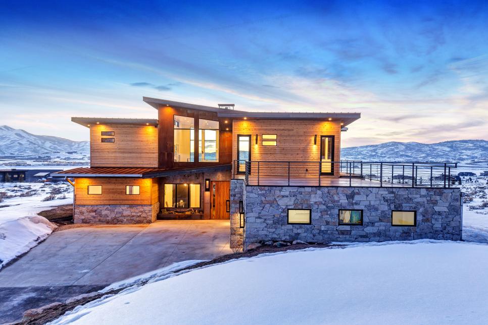 Modern Cabin Mansion Amongst Snow-Covered Mountains
