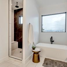 Luxury Master Bathroom Featuring Marble Finishes