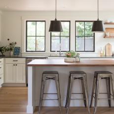 Neutral Transitional Kitchen With Metal Stools