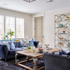 Transitional Sitting Room With Blue Sofas