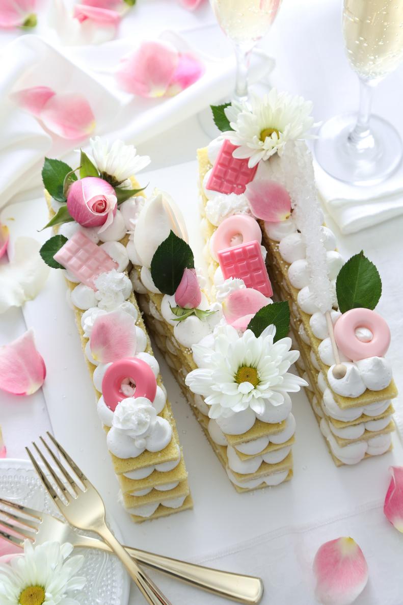 Letter Cake Covered in Pink Flowers